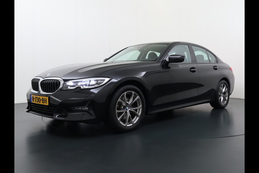 BMW 3-serie 320i 2.0T 184pk AUT-8 Navi-Pro Apple Carplay Android Bordherk. Sport Line Shadow-Line Sportstoel+ 1/2 Leer PDC-a+v Teleservice D HiFi+9speakers Drive-Assist LED Connected-Services LED Live Cockpit Pro Active guard DAB WiFi 1600kg trekvermogen