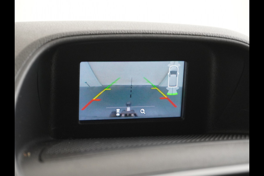 Ford Transit Custom 290 2.0D-131PK AUT-6 L1H1 Navi Camera Trekhaak PdcAirco Cruise Regen-/lichtsensor Euro 6 Trend Bluetooth Voorruit Verwarmd Achterklep Zijschuifdeur Wandbetimmering Adaptieve bochtverl 1e Eigenaar Euro 6