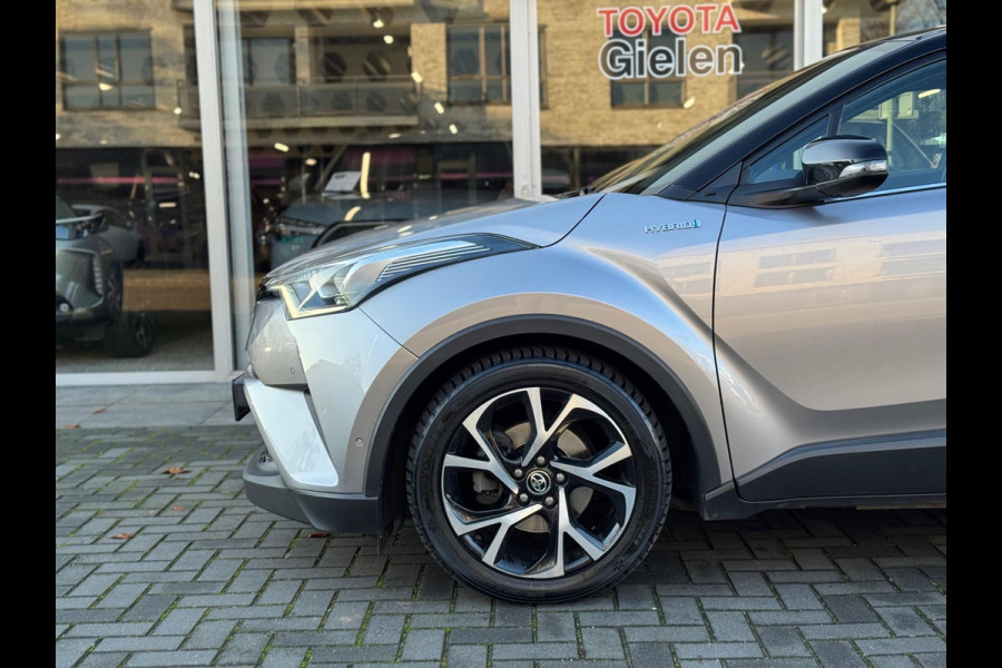 Toyota C-HR 1.8 Hybrid Bi-Tone Plus | JBL, LED Pakket, Dodehoekherkenning, Navigatie, Parkeersensoren, Stoelverwarming, Keyless, 18 inch