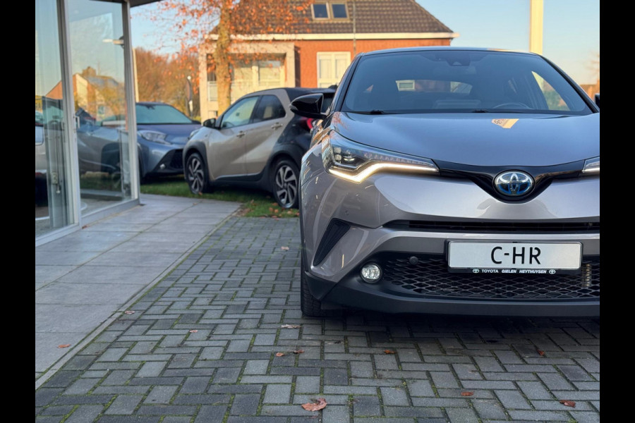 Toyota C-HR 1.8 Hybrid Bi-Tone Plus | JBL, LED Pakket, Dodehoekherkenning, Navigatie, Parkeersensoren, Stoelverwarming, Keyless, 18 inch