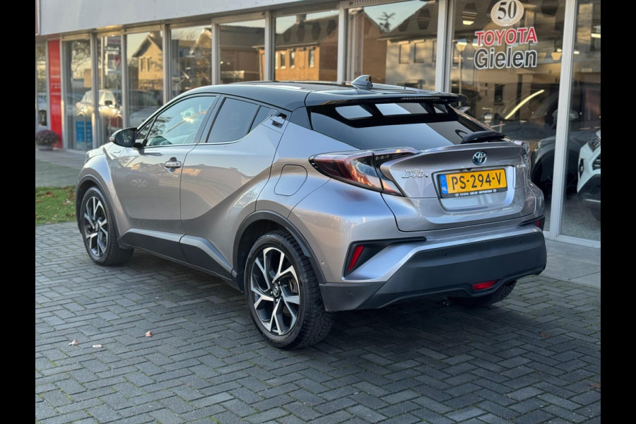 Toyota C-HR 1.8 Hybrid Bi-Tone Plus | JBL, LED Pakket, Dodehoekherkenning, Navigatie, Parkeersensoren, Stoelverwarming, Keyless, 18 inch