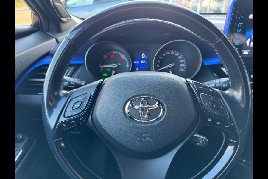 Toyota C-HR 1.8 Hybrid Bi-Tone Plus | JBL, LED Pakket, Dodehoekherkenning, Navigatie, Parkeersensoren, Stoelverwarming, Keyless, 18 inch