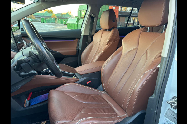 Škoda ENYAQ iV 80 KwH SOH 94% trekhaak Drive sport plus warmtepomp lederen bekleding wit metallic 21 inch lichtmetalen velgen