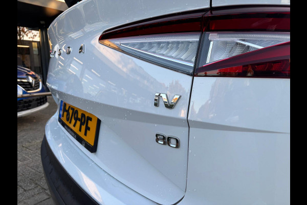 Škoda ENYAQ iV 80 KwH SOH 94% trekhaak Drive sport plus warmtepomp lederen bekleding wit metallic 21 inch lichtmetalen velgen