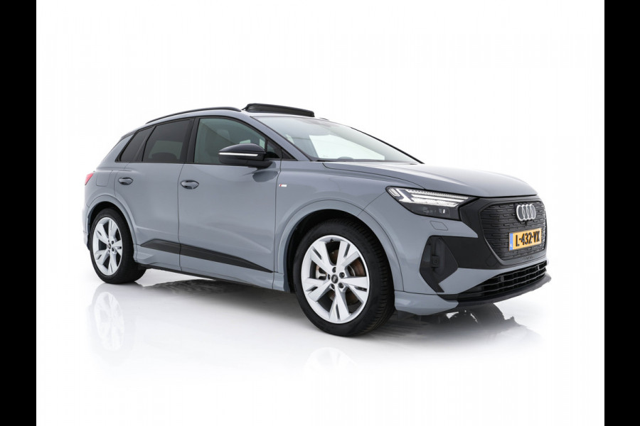 Audi Q4 e-tron 40 Launch edition S Competition 77 kWh [ 3-Fase ] {SOH-90%} (INCL.BTW) *HEAT-PUMP | PANO | HEAD-UP | LEATHER-FABRIC | MATRIX-LED | SONOS-SOUND | ADAPTIVE-CRUISE | HEATED-SPORTSEATS | AMBIENT-LIGHT | DIGI-COCKPIT | CAMERA | KEYLESS | DAB+ | NAVI-FULLMA