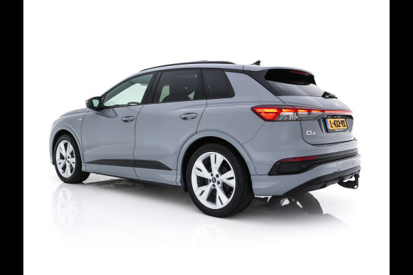 Audi Q4 e-tron 40 Launch edition S Competition 77 kWh [ 3-Fase ] {SOH-90%} (INCL.BTW) *HEAT-PUMP | PANO | HEAD-UP | LEATHER-FABRIC | MATRIX-LED | SONOS-SOUND | ADAPTIVE-CRUISE | HEATED-SPORTSEATS | AMBIENT-LIGHT | DIGI-COCKPIT | CAMERA | KEYLESS | DAB+ | NAVI-FULLMA