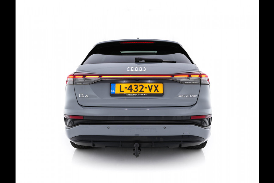 Audi Q4 e-tron 40 Launch edition S Competition 77 kWh [ 3-Fase ] {SOH-90%} (INCL.BTW) *HEAT-PUMP | PANO | HEAD-UP | LEATHER-FABRIC | MATRIX-LED | SONOS-SOUND | ADAPTIVE-CRUISE | HEATED-SPORTSEATS | AMBIENT-LIGHT | DIGI-COCKPIT | CAMERA | KEYLESS | DAB+ | NAVI-FULLMA