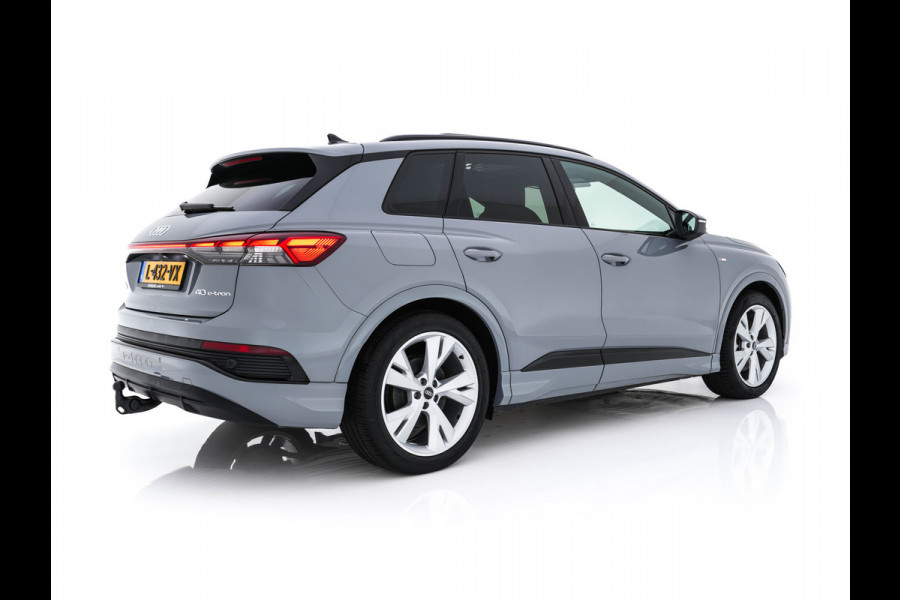 Audi Q4 e-tron 40 Launch edition S Competition 77 kWh [ 3-Fase ] {SOH-90%} (INCL.BTW) *HEAT-PUMP | PANO | HEAD-UP | LEATHER-FABRIC | MATRIX-LED | SONOS-SOUND | ADAPTIVE-CRUISE | HEATED-SPORTSEATS | AMBIENT-LIGHT | DIGI-COCKPIT | CAMERA | KEYLESS | DAB+ | NAVI-FULLMA