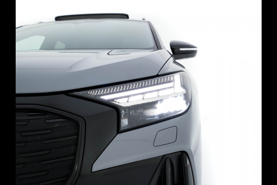 Audi Q4 e-tron 40 Launch edition S Competition 77 kWh [ 3-Fase ] {SOH-90%} (INCL.BTW) *HEAT-PUMP | PANO | HEAD-UP | LEATHER-FABRIC | MATRIX-LED | SONOS-SOUND | ADAPTIVE-CRUISE | HEATED-SPORTSEATS | AMBIENT-LIGHT | DIGI-COCKPIT | CAMERA | KEYLESS | DAB+ | NAVI-FULLMA