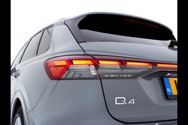 Audi Q4 e-tron 40 Launch edition S Competition 77 kWh [ 3-Fase ] {SOH-90%} (INCL.BTW) *HEAT-PUMP | PANO | HEAD-UP | LEATHER-FABRIC | MATRIX-LED | SONOS-SOUND | ADAPTIVE-CRUISE | HEATED-SPORTSEATS | AMBIENT-LIGHT | DIGI-COCKPIT | CAMERA | KEYLESS | DAB+ | NAVI-FULLMA