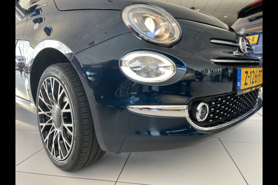 Fiat 500 1.0 Hybrid Airco - Cruise control - Parkeersensoren achter - Open dak - Bluetooth - Navigatiesysteem - Mistlampen voor - Stuur multifunctioneel - Elektrische ramen voor - Stuur leder - Licht metalen vel