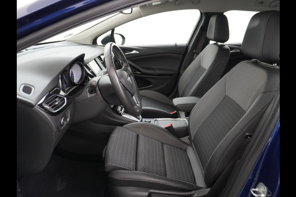 Opel Astra Sports Tourer 1.4T 145pk Navi Camera Lane-dep. Keyless 1/2Leer CruiseControl Led Bluetooth Pdc Apple/Android Aut.Verlichting Isofix Elek.Ramen Ecc Tel. Usb 16''LM Business Elegance
