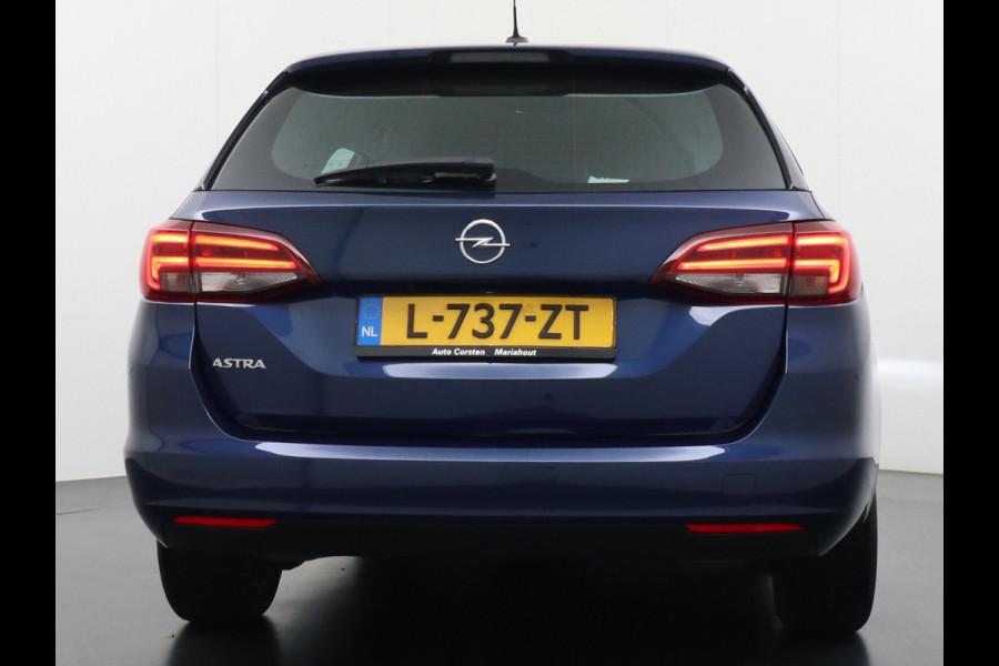 Opel Astra Sports Tourer 1.4T 145pk Navi Camera Lane-dep. Keyless 1/2Leer CruiseControl Led Bluetooth Pdc Apple/Android Aut.Verlichting Isofix Elek.Ramen Ecc Tel. Usb 16''LM Business Elegance
