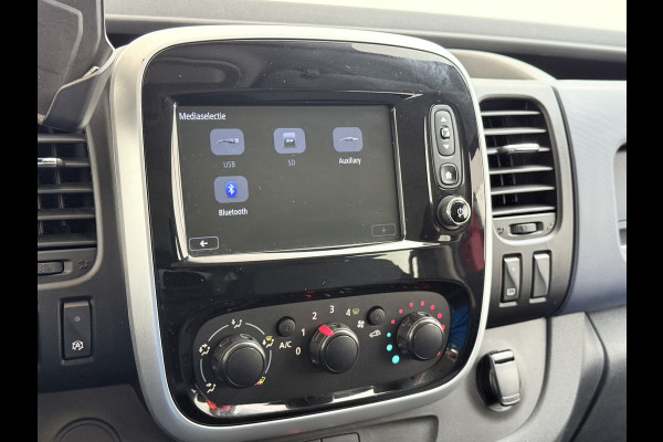 Opel Vivaro 1.6CDTI 126PK L2H1 DC Dubbele Cabine 5-Persoons Navi Camera Airco Trekhaak Cruise Control Pdc Sport EcoFlex Betonplex Vloer Wandbetimmering Schuifdeur Euro 6 1e Eigenaar Origineel Nederlandse Auto