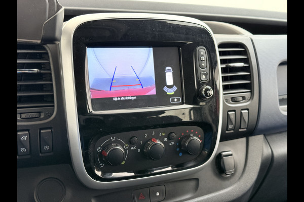 Opel Vivaro 1.6CDTI 126PK L2H1 DC Dubbele Cabine 5-Persoons Navi Camera Airco Trekhaak Cruise Control Pdc Sport EcoFlex Betonplex Vloer Wandbetimmering Schuifdeur Euro 6 1e Eigenaar Origineel Nederlandse Auto