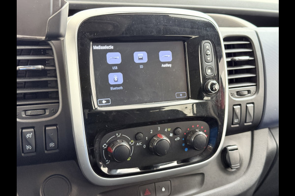 Opel Vivaro 1.6CDTI 126PK L2H1 DC Dubbele Cabine 5-Persoons Navi Camera Airco Trekhaak Cruise Control Pdc Sport EcoFlex Betonplex Vloer Wandbetimmering Schuifdeur Euro 6 1e Eigenaar Origineel Nederlandse Auto