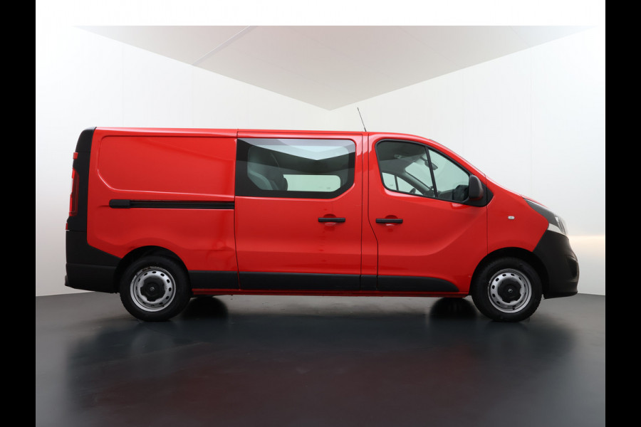 Opel Vivaro 1.6CDTI 126PK L2H1 DC Dubbele Cabine 5-Persoons Navi Camera Airco Trekhaak Cruise Control Pdc Sport EcoFlex Betonplex Vloer Wandbetimmering Schuifdeur Euro 6 1e Eigenaar Origineel Nederlandse Auto