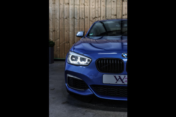 BMW 1-serie M140i xDrive LCI2 *Schuifdak*H/K*Navi Pro*1e eigenaar*
