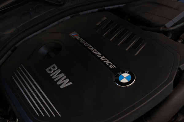 BMW 1-serie M140i xDrive LCI2 *Schuifdak*H/K*Navi Pro*1e eigenaar*