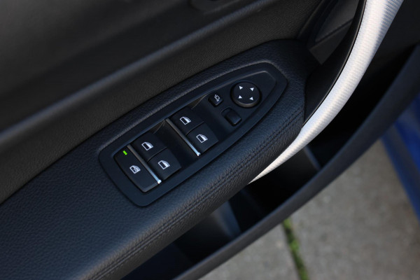 BMW 1-serie M140i xDrive LCI2 *Schuifdak*H/K*Navi Pro*1e eigenaar*