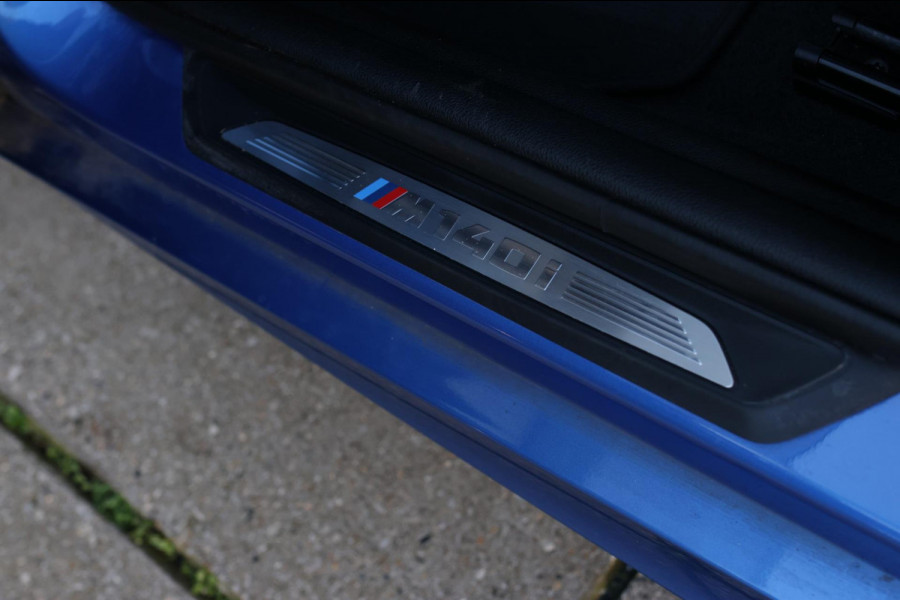 BMW 1-serie M140i xDrive LCI2 *Schuifdak*H/K*Navi Pro*1e eigenaar*