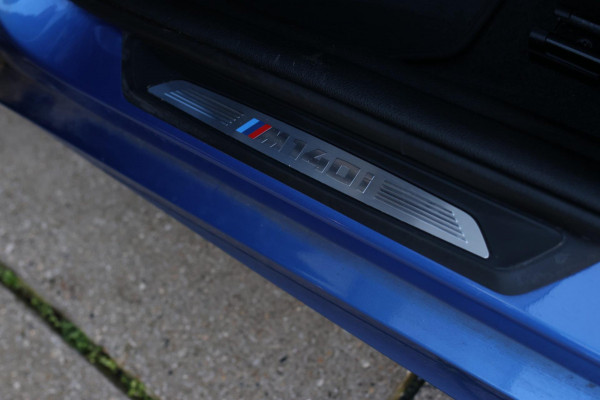 BMW 1-serie M140i xDrive LCI2 *Schuifdak*H/K*Navi Pro*1e eigenaar*