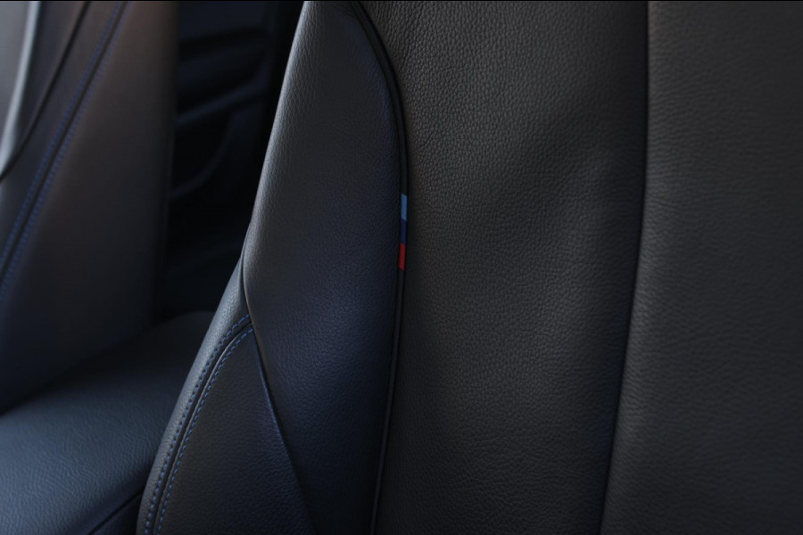 BMW 1-serie M140i xDrive LCI2 *Schuifdak*H/K*Navi Pro*1e eigenaar*