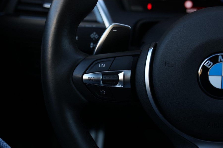 BMW 1-serie M140i xDrive LCI2 *Schuifdak*H/K*Navi Pro*1e eigenaar*