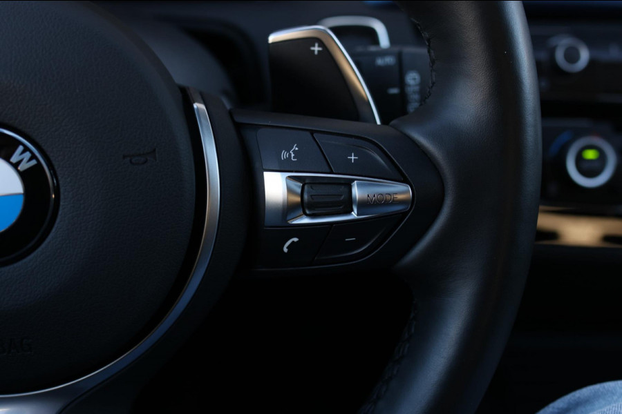 BMW 1-serie M140i xDrive LCI2 *Schuifdak*H/K*Navi Pro*1e eigenaar*