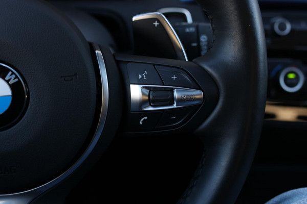 BMW 1-serie M140i xDrive LCI2 *Schuifdak*H/K*Navi Pro*1e eigenaar*