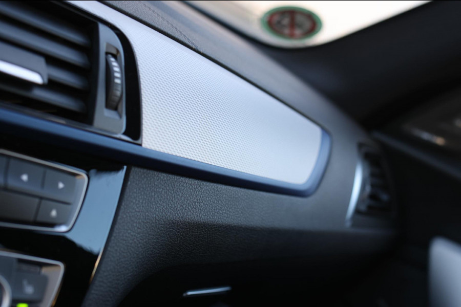 BMW 1-serie M140i xDrive LCI2 *Schuifdak*H/K*Navi Pro*1e eigenaar*