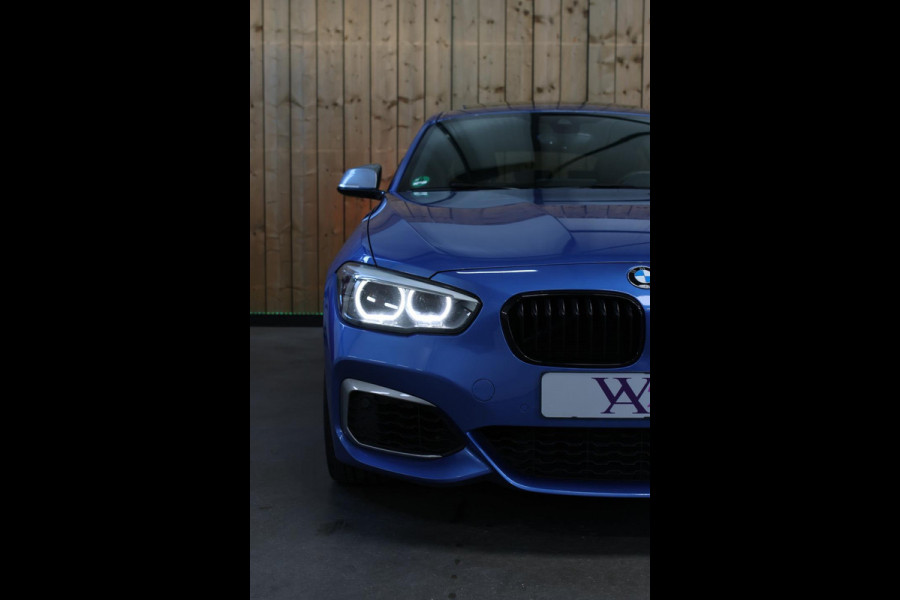 BMW 1-serie M140i xDrive LCI2 *Schuifdak*H/K*Navi Pro*1e eigenaar*