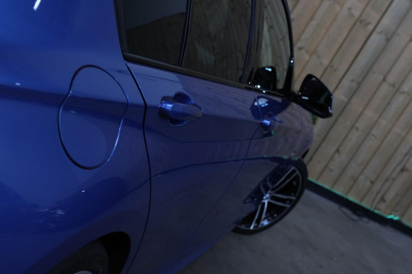 BMW 1-serie M140i xDrive LCI2 *Schuifdak*H/K*Navi Pro*1e eigenaar*