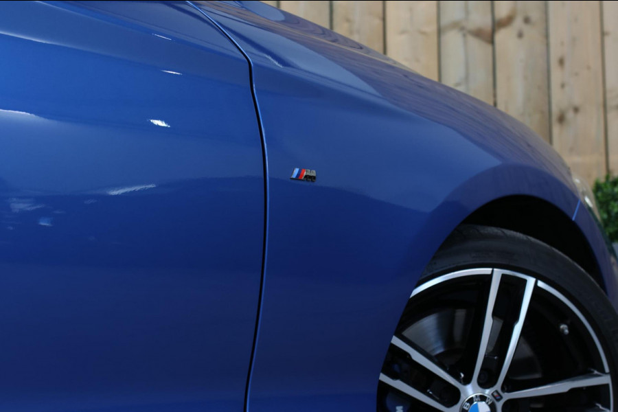 BMW 1-serie M140i xDrive LCI2 *Schuifdak*H/K*Navi Pro*1e eigenaar*