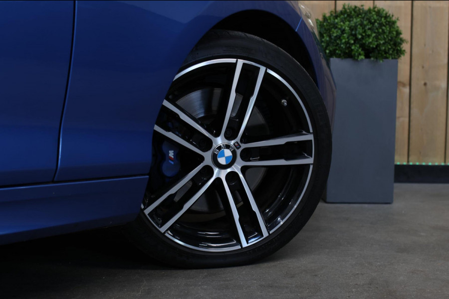BMW 1-serie M140i xDrive LCI2 *Schuifdak*H/K*Navi Pro*1e eigenaar*