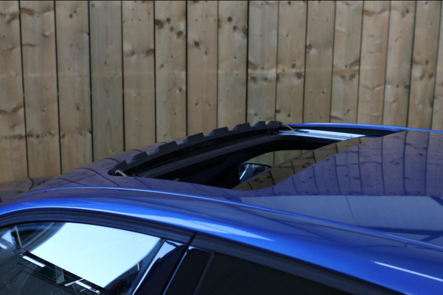 BMW 1-serie M140i xDrive LCI2 *Schuifdak*H/K*Navi Pro*1e eigenaar*