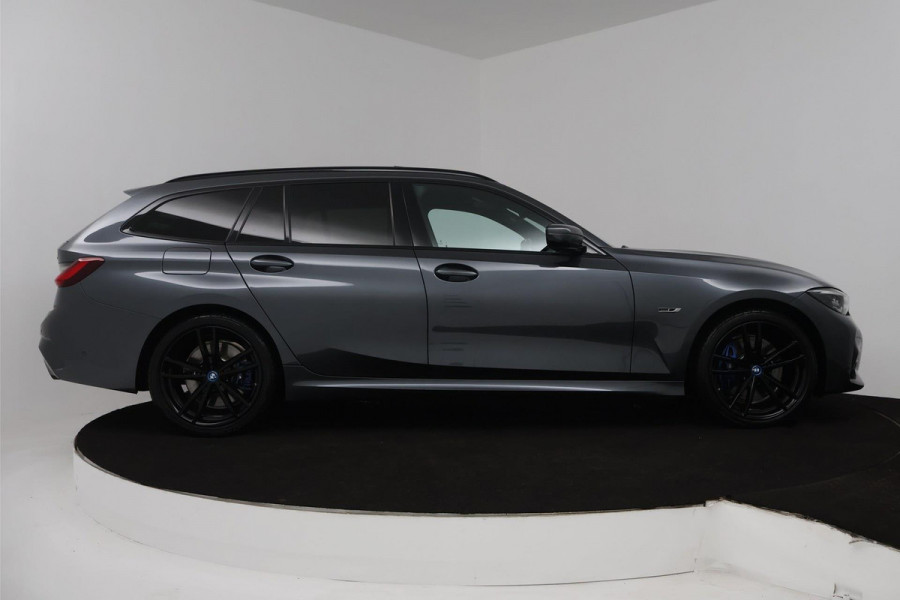 BMW 3 Serie Touring 330e High Executive (PANORAMADAK, TREKHAAK, STOELVERWARMING, ACHTERUITRIJCAMERA, STUURVERWARMING)