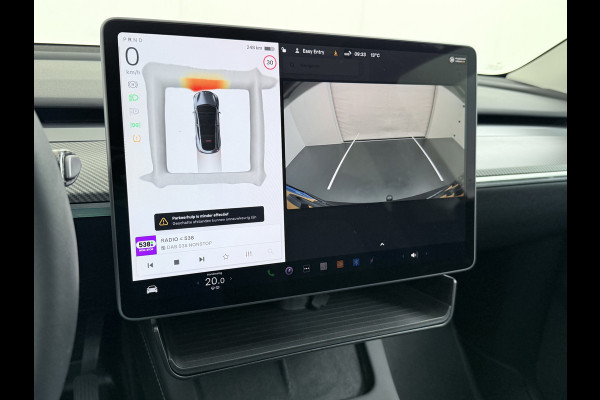 Tesla Model Y RWD 60kWh LFP-Accu S.O.H. 96% Trekhaak Warmtepomp Lmv 20" Ambient Interieur Verlichting Adap.Cruise Navi Ecc Camera's Panoramada Autopilot Stoel+Stuur+Achterbank Verwarming Elek.Achterklep Dodehoek detector Draadloze telefoonlader Origineel Nederlandse Auto 1.600KG Trekgewicht