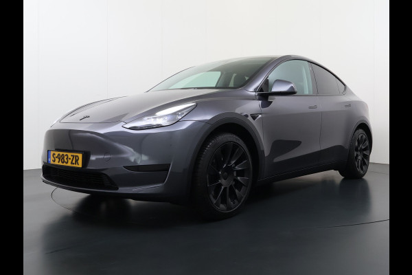 Tesla Model Y RWD 60kWh LFP-Accu S.O.H. 96% Trekhaak Warmtepomp Lmv 20" Ambient Interieur Verlichting Adap.Cruise Navi Ecc Camera's Panoramada Autopilot Stoel+Stuur+Achterbank Verwarming Elek.Achterklep Dodehoek detector Draadloze telefoonlader Origineel Nederlandse Auto 1.600KG Trekgewicht