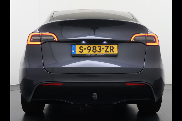 Tesla Model Y RWD 60kWh LFP-Accu S.O.H. 96% Trekhaak Warmtepomp Lmv 20" Ambient Interieur Verlichting Adap.Cruise Navi Ecc Camera's Panoramada Autopilot Stoel+Stuur+Achterbank Verwarming Elek.Achterklep Dodehoek detector Draadloze telefoonlader Origineel Nederlandse Auto 1.600KG Trekgewicht