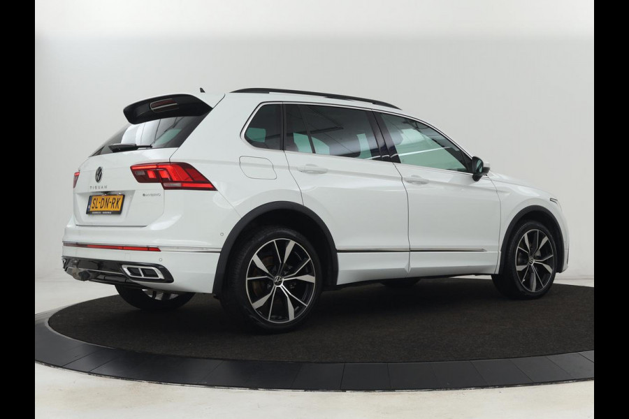 Volkswagen Tiguan 1.4 eHybrid R Line | Panoramadak | Trekhaak | Stoelverwarming | Camera | 20'' | Park Assist | Carplay | Matrix LED | Stuurverwarming | Adaptive cruise | Navigatie | PHEV | Plug In