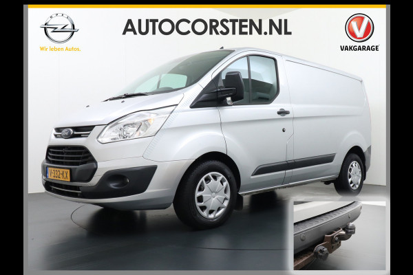 Ford Transit Custom 290 2.0D-131PK AUT-6 L1H1 Navi Camera Trekhaak PdcAirco Cruise Regen-/lichtsensor Euro 6 Trend Bluetooth Voorruit Verwarmd Achterklep Zijschuifdeur Wandbetimmering Adaptieve bochtverl 1e Eigenaar Euro 6