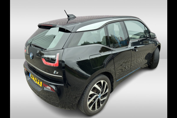 BMW i3 Basis 120Ah 42 kWh / Navigatie / 19'' / Parkeerhulp achter / Navigatie / Harman Kardon / Stoelverwarming / Cruise Control / Warmtepomp / Getint glas