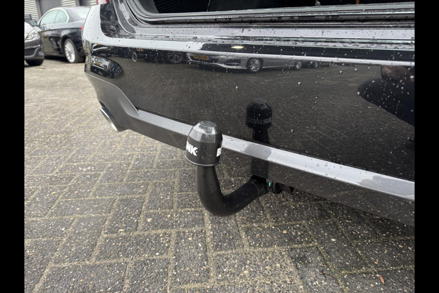 BMW 3 Serie Touring 320i High Executive M-Sport | Camera | Navigatie | DAB | 19 Inch Lichtmetalen Velgen | Lederen Bekleding |