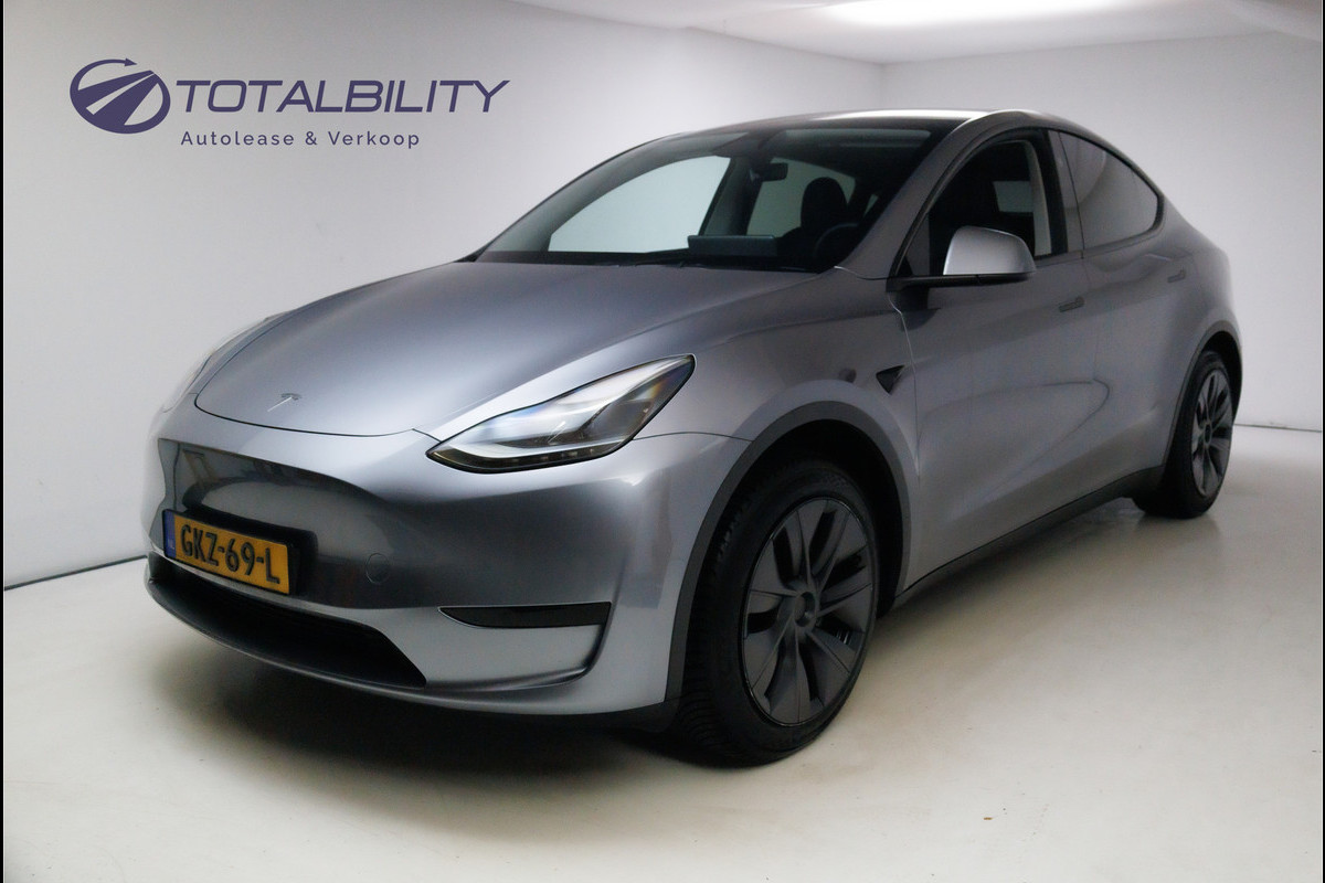 Tesla Model Y Long Range RWD 75 kWh | Trekhaak | Panoramadak | Autopilot | 19 inch Dark velgen, Leer