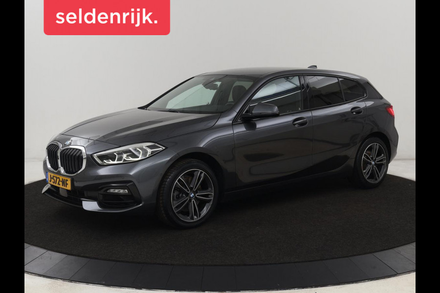 BMW 1-serie 118i Executive | Sport Line | Camera | Carplay | Sportstoelen | Live Cockpit | Navigatie | Full LED | Climate control | Sfeerverlichting | Cruise control | Park Assist | Bluetooth | Getint glas