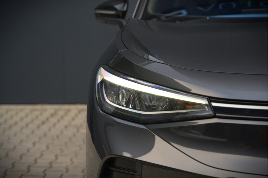 Volkswagen ID.4 First 77 kWh | Stoelverwarming | Stuurverwarming | Trekhaak | Warmtepomp | Adaptive Cruise Control | Navigatie | Apple Carplay | Keyless | Camera | Parkersensoren |