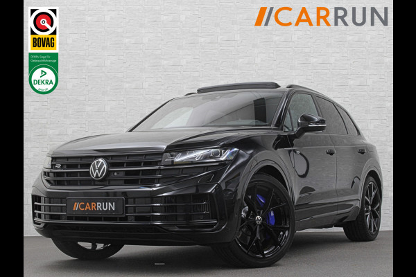 Volkswagen Touareg R 3.0 TSI 462PK E-Hybrid | Luchtvering | Puglia-Leder | Panorama | DYN-Audio | Massage | Ventilatie | ACC | Trekhaak | Nachtzicht | Head-Up | Ergo-Comfort | 22" | Keyless-Entry | Memory | 4-Zone Clima | ISO-Glas | Stoelverwarming V+A | Dodehoek | Standkachel | Carplay | Draadloos Laden |