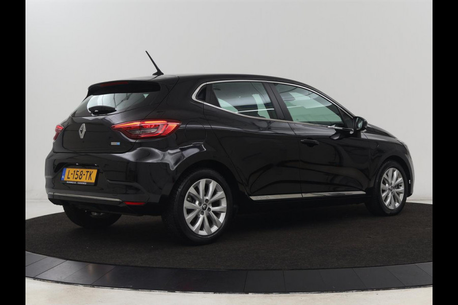 Renault Clio 1.6 E-Tech Hybrid 140 Intens | Stoelverwarming | Camera | Carplay | Stuurverwarming | Half leder | Full LED | Navigatie | Climate control | Cruise control | Parkeerhulp