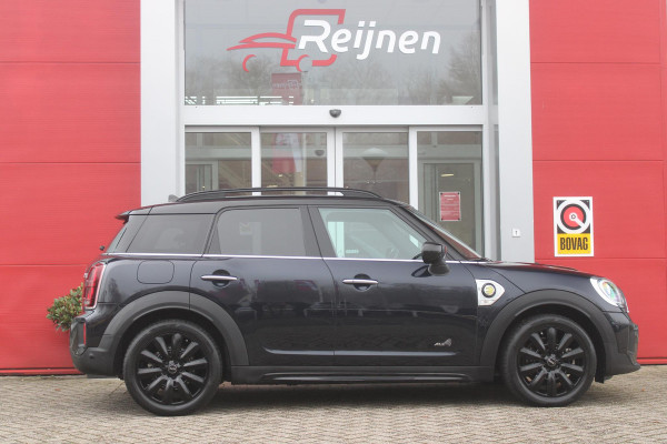 MINI Countryman 2.0 Cooper S E 220PK ALL4 CHILI | UNION JACK ACHTERLICHTEN | LEDEREN BEKLEDING | ELEKTRISCH BEDIENBARE VOORSTOELEN MET GEHEUGENFUNSCTIE OP DE BESTUURDERSSTOEL | STOEL/VOORRUIT VERWARMING | FULL LED KOPLAMPEN | DRAADLOZE APPLE CARPLAY/ANDROID AUTO | DRAADLOZE TELEFOONLADER | NAVIGATIE | EXTRA GETINTE ACHTERRUITEN | ZWART DAK | 18" LICHTMETALEN VELGEN BLACK 10 SPAAKS | ACHTERUITRIJ CAMERA | PARKEERSENSOREN VOOR EN ACHTER | CLIMATE CONTROL | KEYLESS ENTRY/START | HUD (HEAD UP DISPLAY) | ADAPTIVE CRUISE CONTROL | DAB+ RADIO | DONKERE HEMEL BEKLEDING |